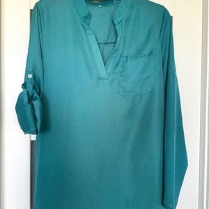 Roll up, long sleeve blouse.